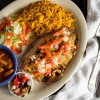 Tilapia Pacifico · Spicy. Spicy seasoned tilapia fillet grilled and topped with fresh salsa de pina made with b...