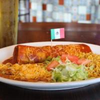 Grande Burrito · A giant flour tortilla stuffed with choice of chicken, shredded beef, chili verde, red chile...