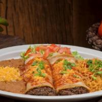 Southwestern Enchiladas · Shredded beef enchiladas topped with red Chile. Served with Spanish rice and choice of beans.
