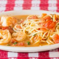 Shrimp Scampi · Shrimp sautéed in olive oil with fresh tomatoes, roasted garlic, white wine, and lemon, serv...