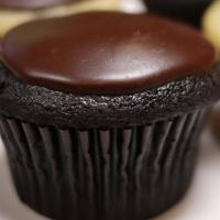 Icebox Cupcake · Chocolate cake with whipped cream frosting inside and topped with a rich chocolate ganache.