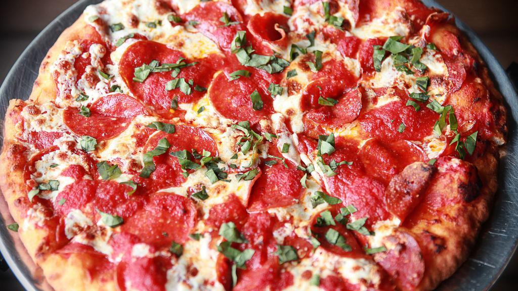 Pepperoni Pizza · Pepperoni, Mozzarella, tomato sauce, and fresh Basil