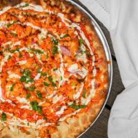 Buffalo Chicken Pizza · Handcrafted Buffalo Sauce, Fresh Mozzarella, Onions, Cilantro