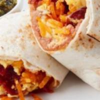 Chorizo Breakfast Burrito · Two scrambled eggs, chorizo, and melted cheese wrapped in a fresh flour tortilla.