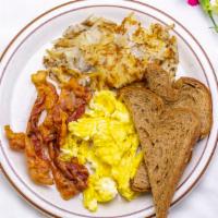 Breakfast Special Platter · Two eggs, bacon, hash brown and toast. Not in crepe.