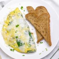 La Jardinaire Omelette · Three eggs, spinach & mushroom w/ feta and mozzarella cheese.