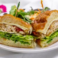 Chicken Salad Sandwich · Lettuce, sun dried tomato, toasted walnuts & mayo with choice of side salad or Lays chips.