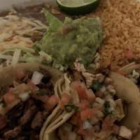 Tacos El Mariachi · 3 tacos. Asada, chicken and carnitas with pico de gallo. Served with rice, beans and pico de...
