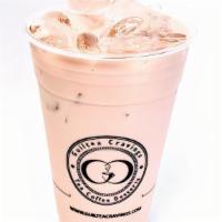 Strawberry Milk Tea  · Made with green tea and real strawberry.