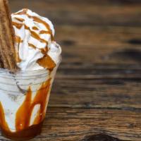 Churro Boba Sundae · Churro with your choice of  ice cream top with cream, boba, and chocolate.