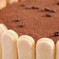 Tiramisu Cake · Tiramisu is a coffee-flavored Italian dessert. It is made of ladyfingers dipped in coffee, l...