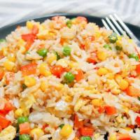 House Fried Rice · Seasoned and made with eggs, sweet peas, carrots, onion, corns, and with your choice of prot...