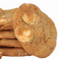 White Chip  Macadamia Cookie · Filled with white chips and macadamia nuts. Choose from 6, 8, and 12 cookies per box.