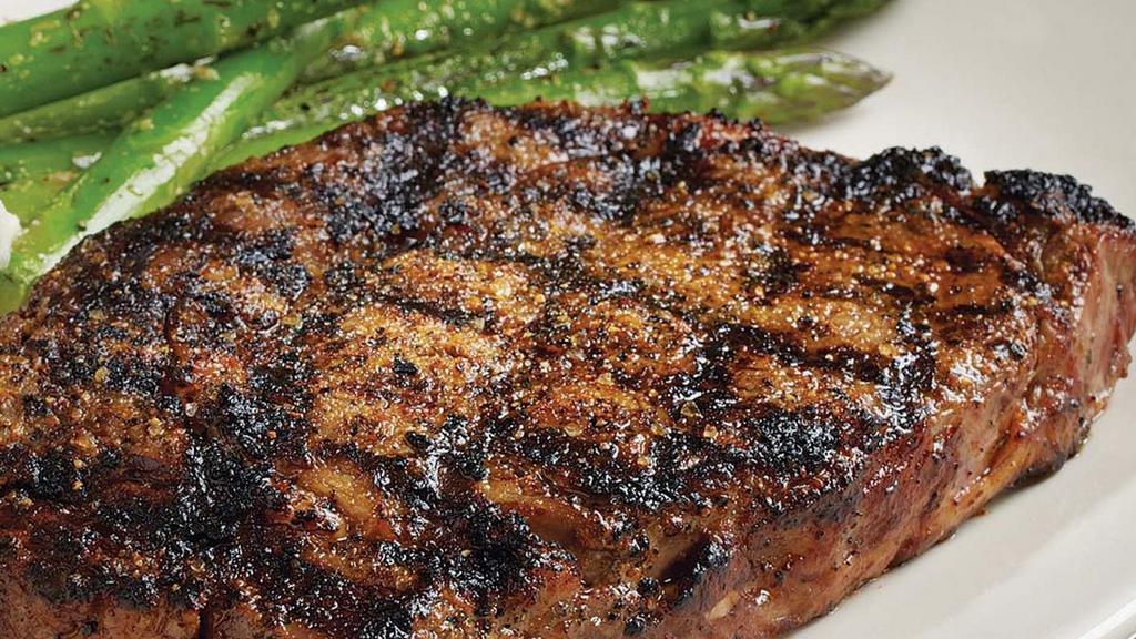 Classic Rib-Eye* · A juicy, well-marbled, 3/4-pound rib-eye steak accompanied by your choice of two classic sides.