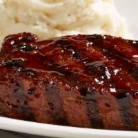 Slow-Roasted Tri-Tip Entree* · 8 oz. of mouthwatering sliced, slow-roasted sirloin tri-tip covered in peppered BBQ sauce an...