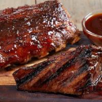 Tri-Tip And Ribs* · 6 oz. of mouthwatering, sliced sirloin tri-tip and a half rack of tender baby back ribs cove...
