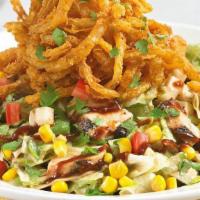 Barbeque Chicken Chopped Salad · A bright combination of crisp romaine and iceberg lettuce, piled high with tender grilled ch...