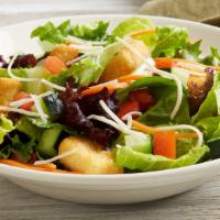 House Salad · A delightful mix of baby field greens, carrots, diced tomatoes, cucumbers, oven-baked crouto...