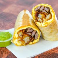 Bacon, Sausage, Egg & Cheddar Breakfast Burrito · 3 fresh cracked, cage-free scrambled eggs, melted Cheddar cheese, smokey bacon, pork sausage...