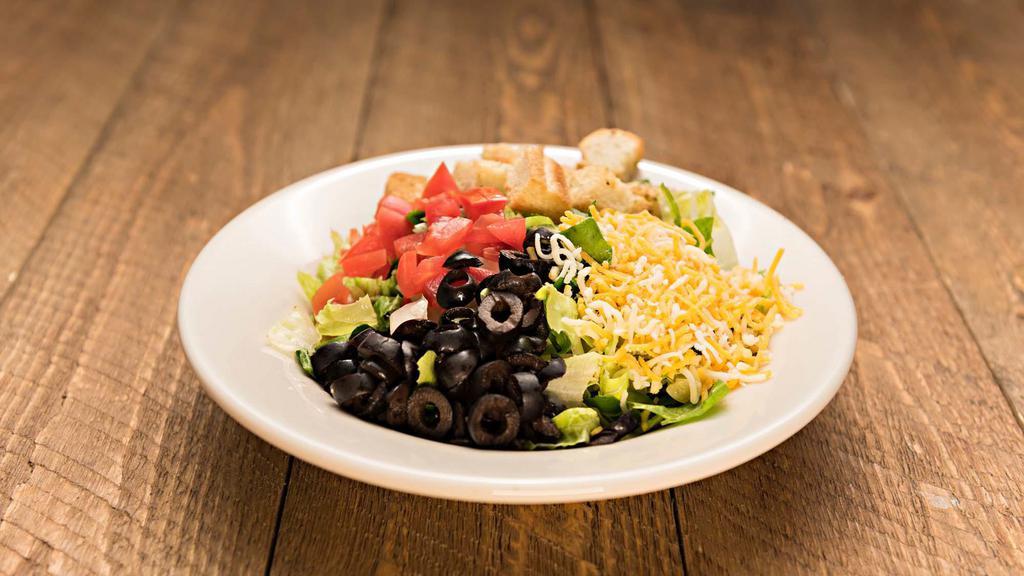 House · Bed of fresh lettuce, tomatoes, black olives, cheese, croutons with no dressing. 160 calories.