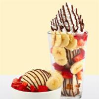 Captain'S Breakfast™ · Cap'n crunch ice cream®, strawberries, banana, nutella.