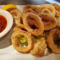 Calamari Fritti · Lightly battered crisp squid served with our spicy marinara sauce.