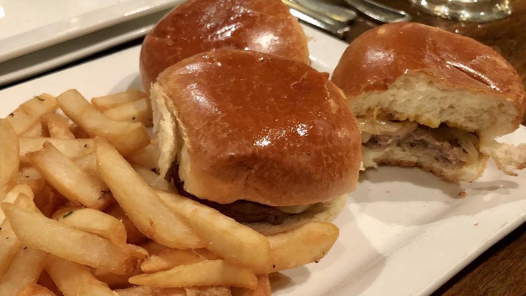 Beef Sliders · 3 mini burgers, cheddar cheese, grilled onions, French fries.