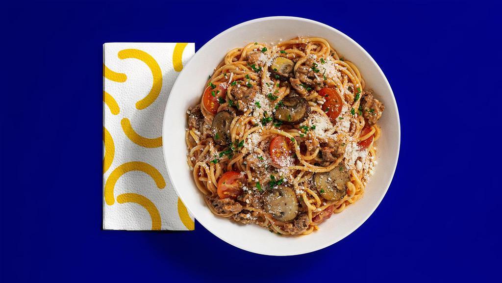 House Spaghetti · Spaghetti with tomato cream sauce, Italian sausage, mushrooms, cherry tomatoes, fresh parsley, parmesan