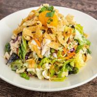 Asian Chicken Salad · Chicken breast, lettuce mix, scallions, wontons, almonds, mandarin oranges, sesame dressing.