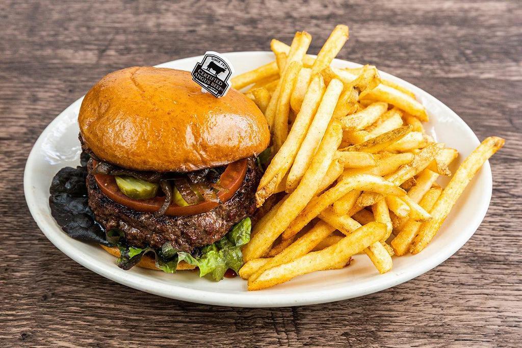 Classic Burger · CAB® ground chuck, lettuce, tomato, pickles, caramelized onions, toasted bun.