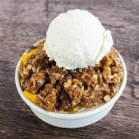 Mom'S Deep Dish Peach Cobbler · Our made-from-scratch cobbler with peaches, brown sugar, & cinnamon.  Served with vanilla ic...