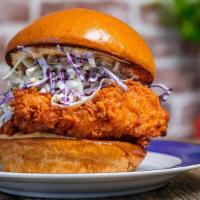 Fried Heater · Doused in spicy oil and house spice mix, creamy slaw and cajun aioli