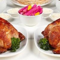 Big Family Meal · 2 delectably savory Rotisserie Chickens, served with a large side of Pickled Turnips, 8 Garl...
