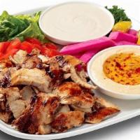Chicken Tarna Plate · (Customer Favorite!) Hand-sliced, boneless chicken, marinated in an herb bath using traditio...