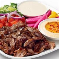 Tri-Tip Shawerma Plate · Hand-sliced U.S.D.A. Choice Tri-Tip beef, marinated in an herb bath using traditional season...