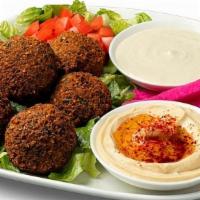 Falafel Plate · A curated blend of garbanzo beans, raw herbs and spices, crafted from scratch and fried in 1...