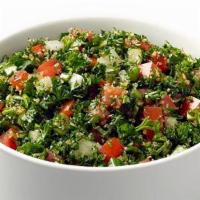 Tabbouleh Salad · Hand-chopped parsley and fresh mint leaves, finely diced onion and bulgur wheat, tossed with...