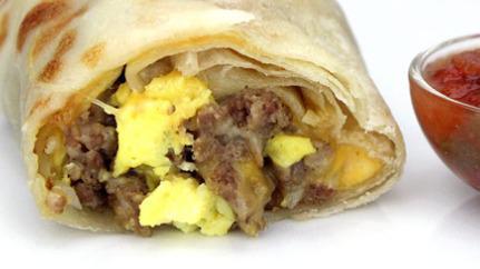 Sausage Breakfast Burrito · The Sausage Breakfast Burrito includes 
Sausage, 
Hash browns, 
3 scrambled eggs, 
Shredded Cheddar and Monterey Jack cheese
Homemade Salsa on the side