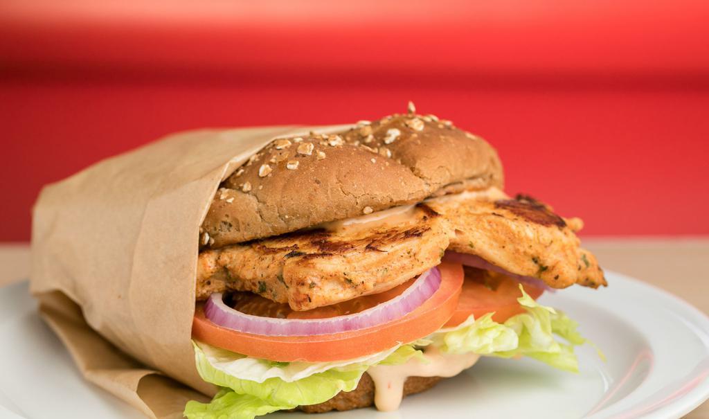 Chicken Breast Sandwich Combo · Grilled Chicken Sandwich  Includes:
1000 Island Dressing,
Red Onions,
Lettuce, 
Tomatoes,
Pickles,
Whole Wheat Bun

Combo includes French Fries and Drink