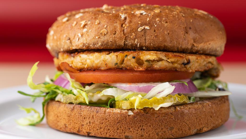 Veggie Burger · Veggie Burger includes: 

Gardenburger Veggie Patty,
red onions, 
lettuce,
tomato, 
pickles, 
1000 island dressing, 
Served on a wheat bun.
(lettuce wrap available upon request).