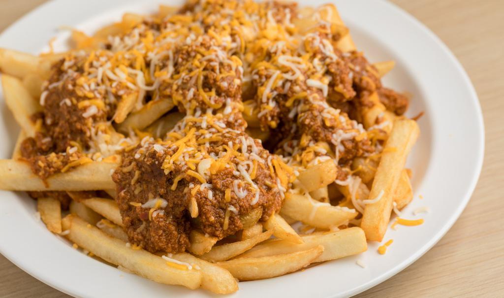 Chili Cheese Fries · Chili Cheese Fries include:

Homemade Chili,
Crispy Fries,
Shredded Monterey Jack and Cheddar cheese