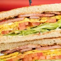 Ham & Egg Sandwich · Ham and Egg Sandwich includes: 

Ham Slices,
3 CA Fresh Eggs
Lettuce, 
Tomatoes,
Mayonnaise....