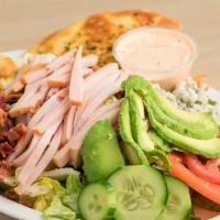 Cobb Salad · Cobb Salad includes: 

Turkey,
Bacon, 
Avocado,
Blue Cheese Crumbles,
Romaine and Iceberg Le...