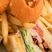 Clubhouse Classic With Fries · Clubhouse Classic Includes: 

Turkey,
Ham,
Bacon,
American & Swiss Cheese,
Lettuce,
Tomato,
...