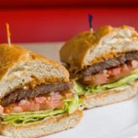 Steak Sandwich · Steak Sandwich Includes

Grilled Steak,
1000 Island Dressing,
Lettuce,
Tomatoes,
Red Onions....
