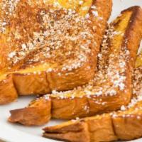 French Toast · 6 Pieces French Toast topped with Cinnamon and Powdered Sugar. 

Served with a Syrup and But...