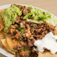 Nachos · Nachos include: 

Your Choice of Carne Asada or Grilled Chicken;
Chips,
Beans,
Shredded Ched...