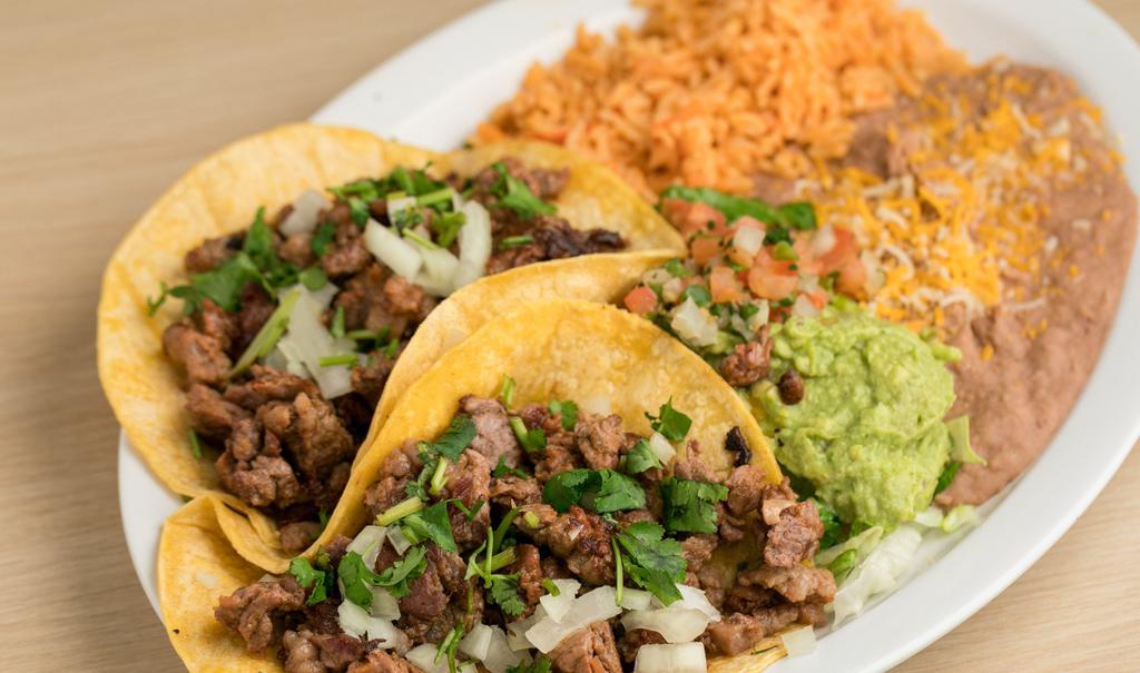 2 Taco Plate · 2 Tacos Plate includes your choice of:

Carne Asada, 
Grilled Chicken, 
Fish,
Beef or Chicken Taquitos, 
Crunchy Beef Tacos. 

Served with Rice, Beans and Homemade Red Salsa on the side.