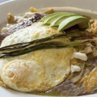 Chilaquiles Del Chef · Two eggs any style served over sautéed crispy corn tortillas, roasted tomatillo green salsa,...