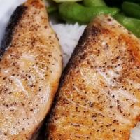 Pan Seared Salmon · Cooked. Sushi grade salmon, pan seared and served with rice, edamame, lemon wedge and house ...